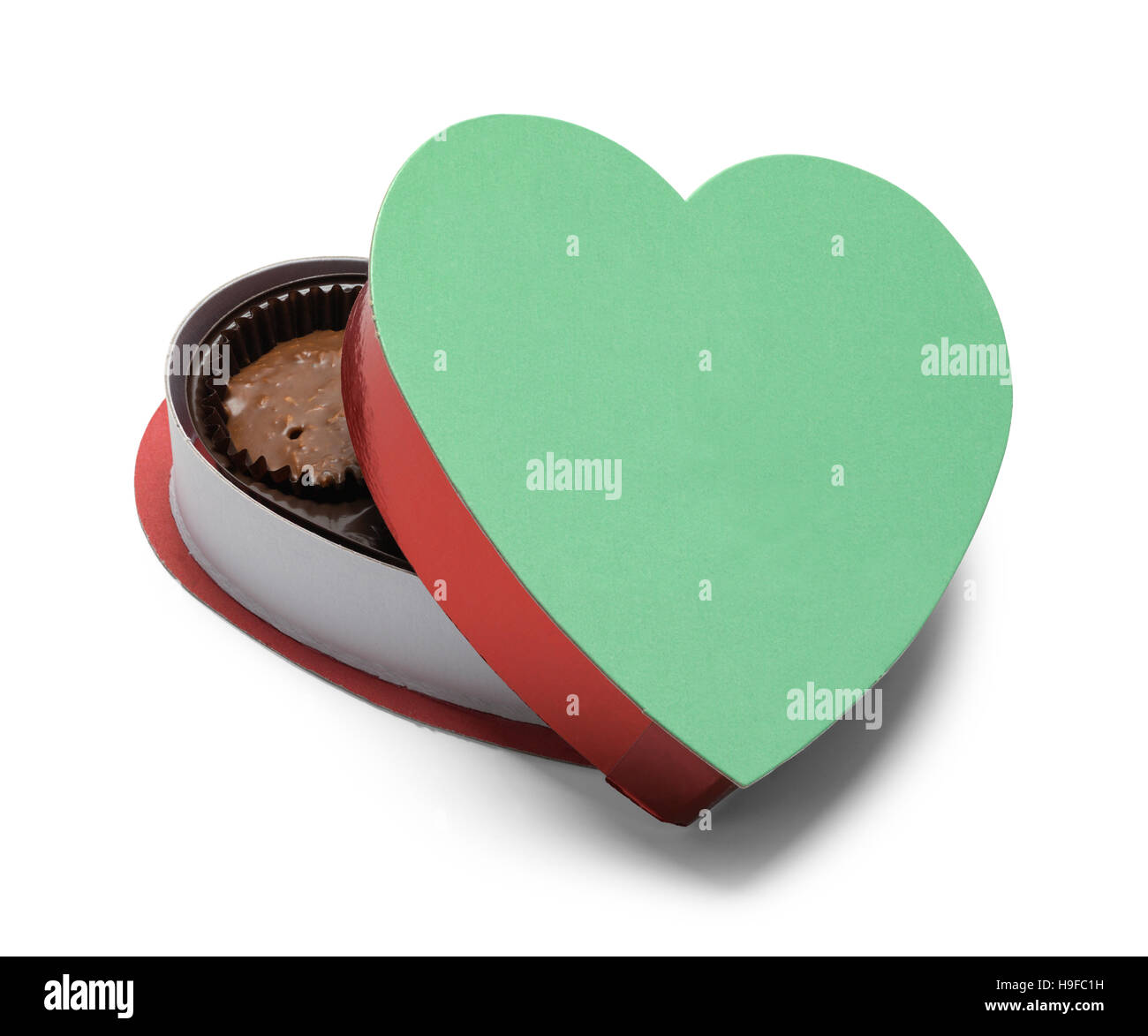Aprire il cuore scatola di cioccolatini isolati su sfondo bianco. Foto Stock