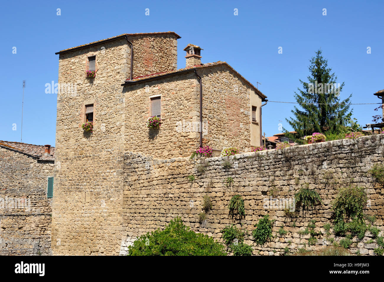 Antiche mura, Asciano, Toscana, Italia Foto Stock