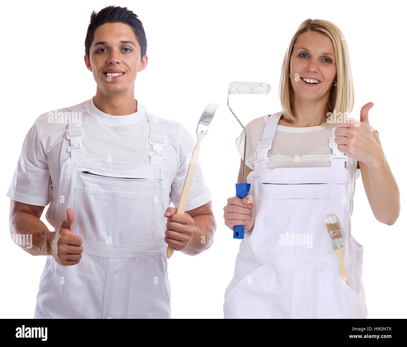 Casa di giovani pittori e decoratori apprendista Thumbs up tirocinanti donna uomo lavoro isolato su uno sfondo bianco Foto Stock