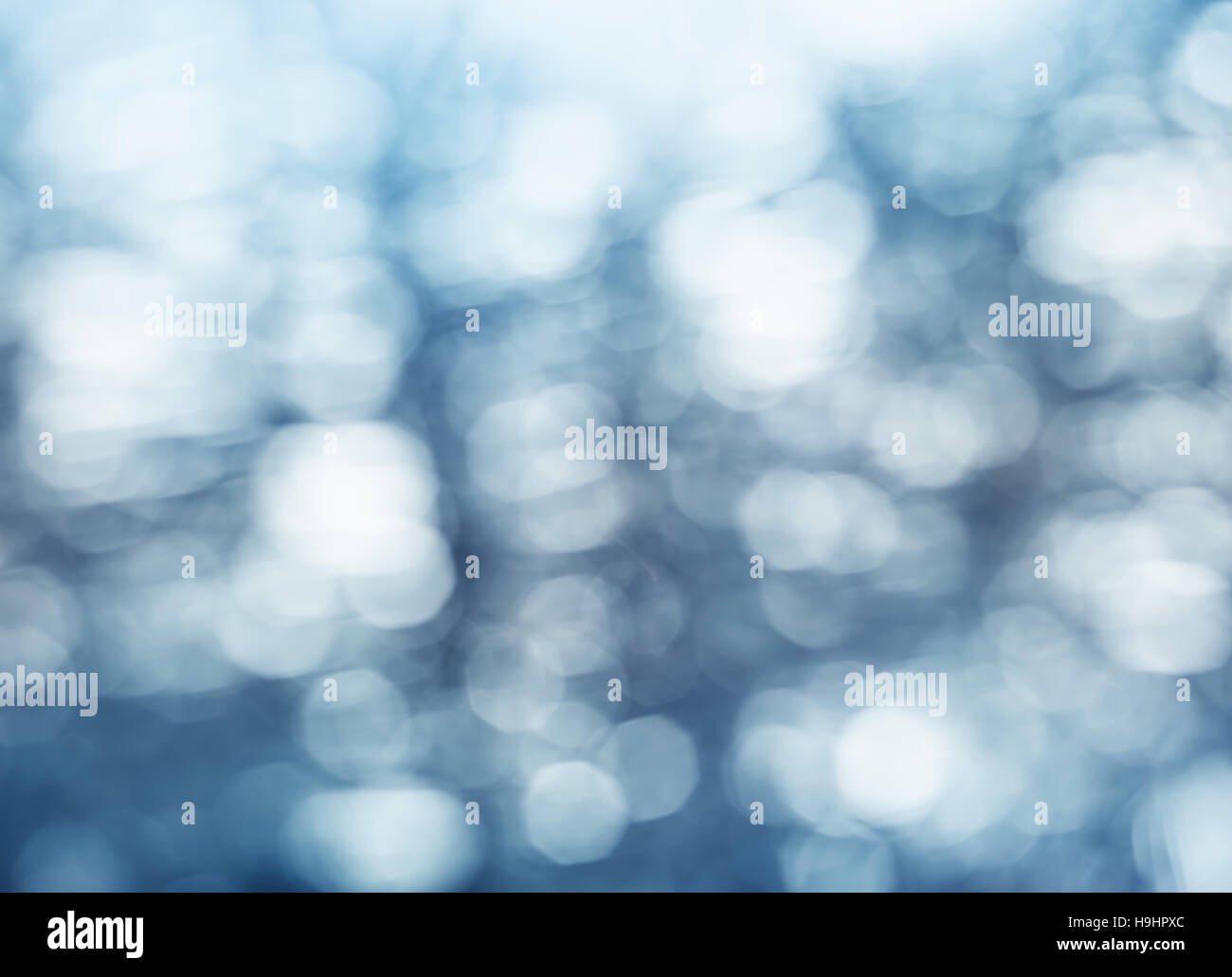 Blu sullo sfondo di Natale con un bellissimo bokeh di fondo Foto Stock