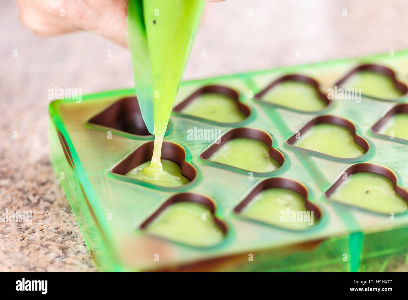 Al cioccolato a forma di cuore Foto Stock