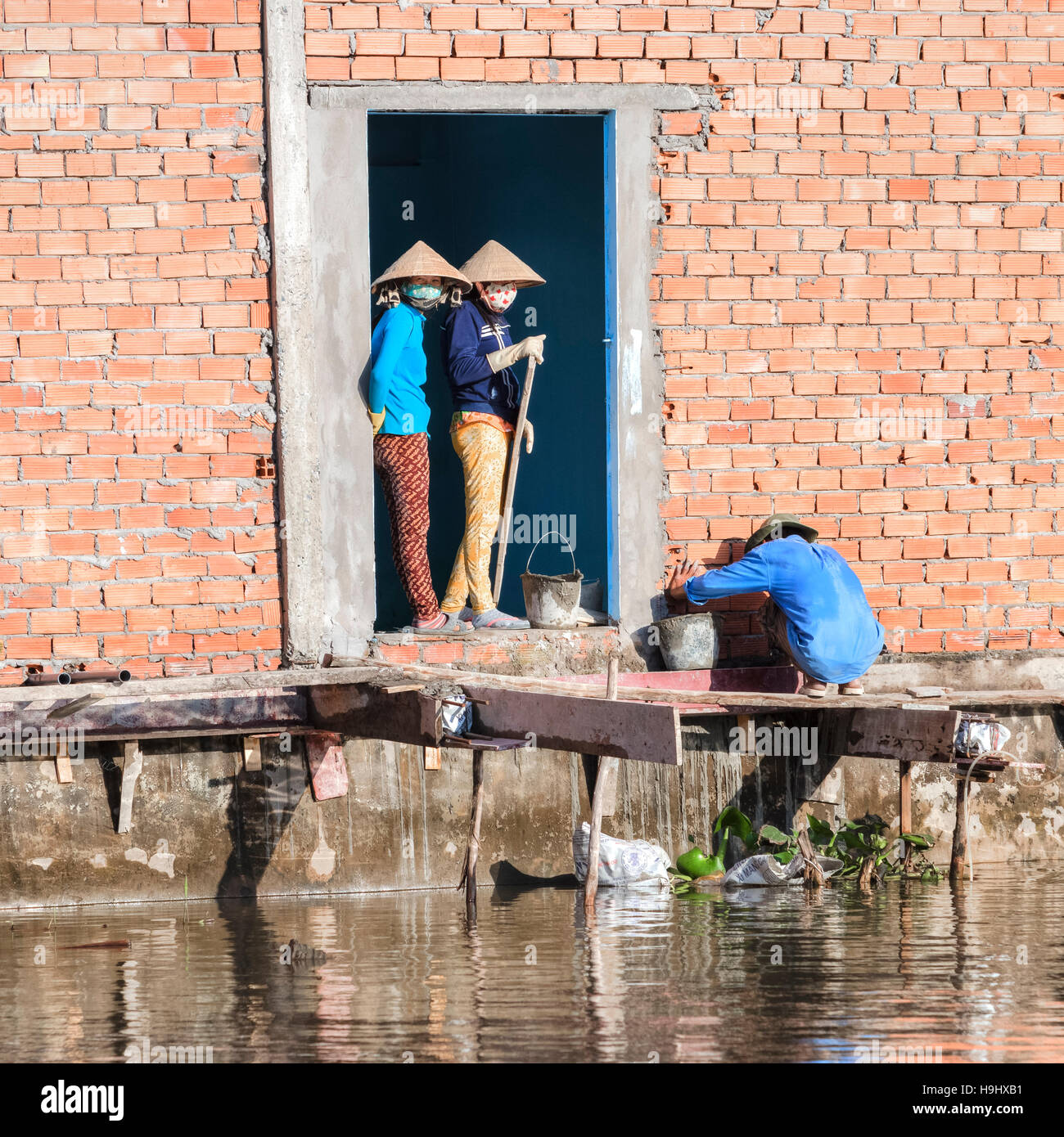La costruzione di una casa a Can Tho, Hau River Delta del Mekong, Vietnam Asia Foto Stock