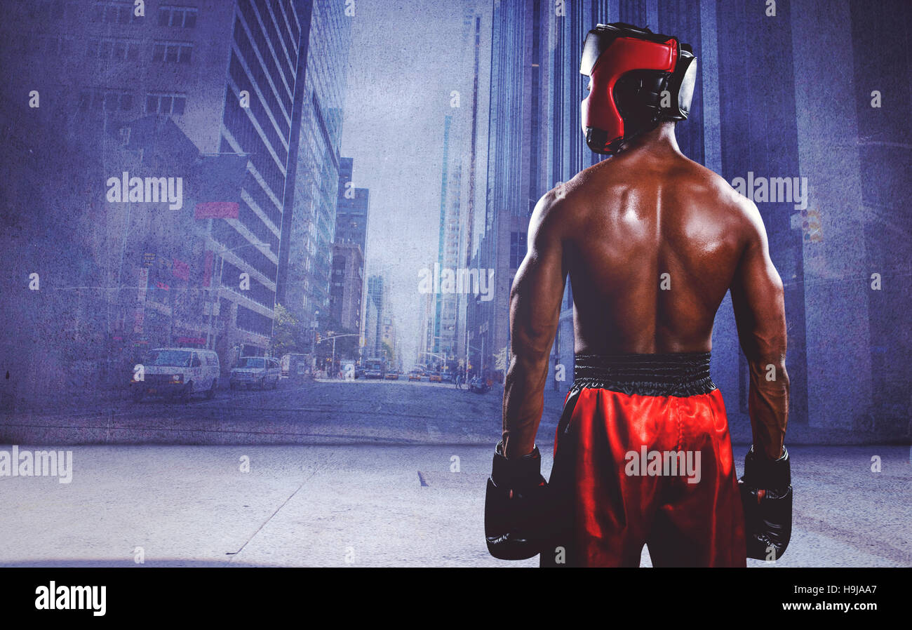 Immagine composita della vista posteriore del boxer in piedi Foto Stock