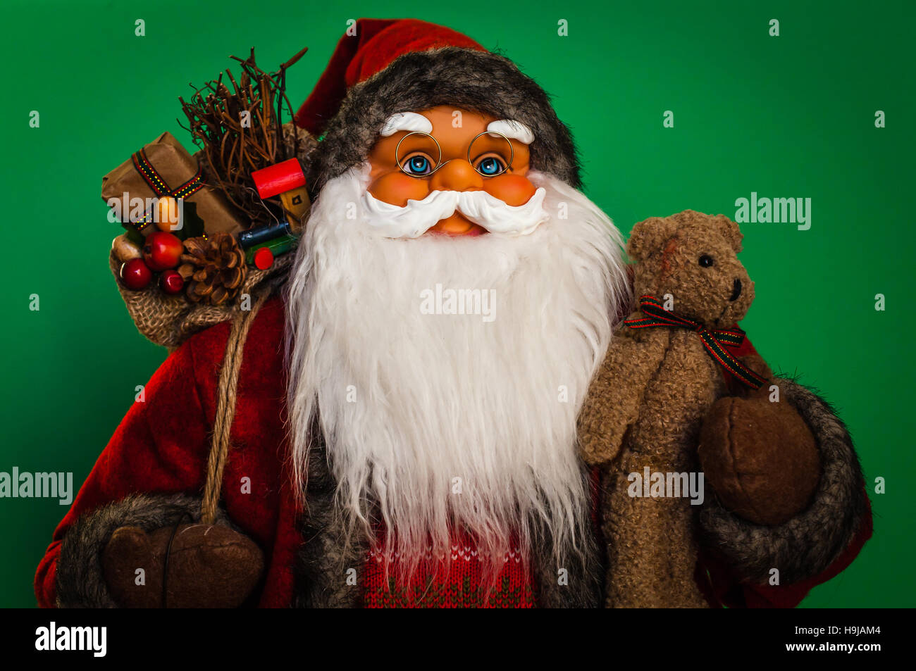 Babbo Natale il corpo superiore close up con sfondo verde. Foto Stock