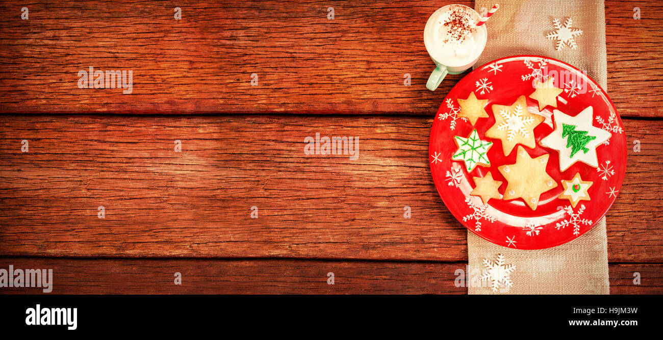 Sweet Food e cappuccino sul tavolo di legno Foto Stock