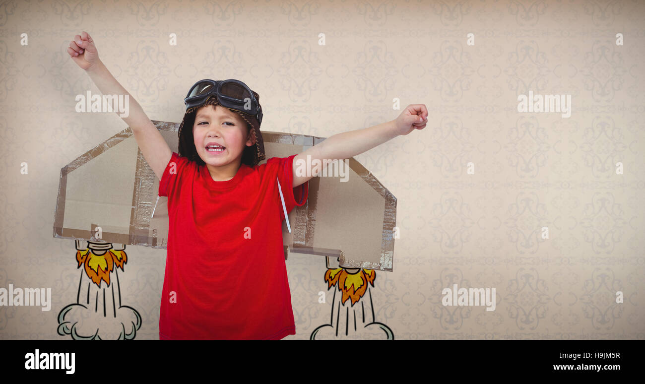 Immagine composita del ragazzo che finge di essere un pilota Foto Stock