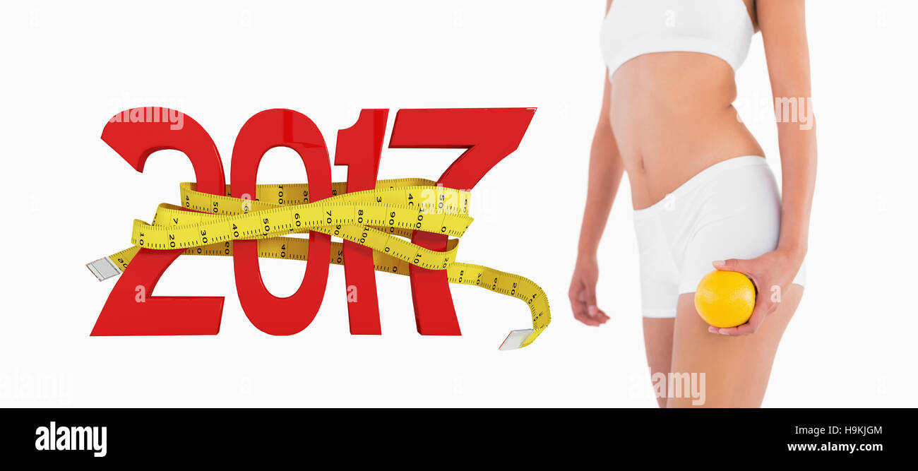 3D'immagine composita di snello corpo femmina bianca con azienda di abbigliamento sportivo di Orange Foto Stock