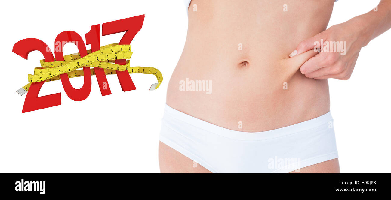 3D'immagine composita della donna in posa senza grasso sul suo ventre Foto Stock