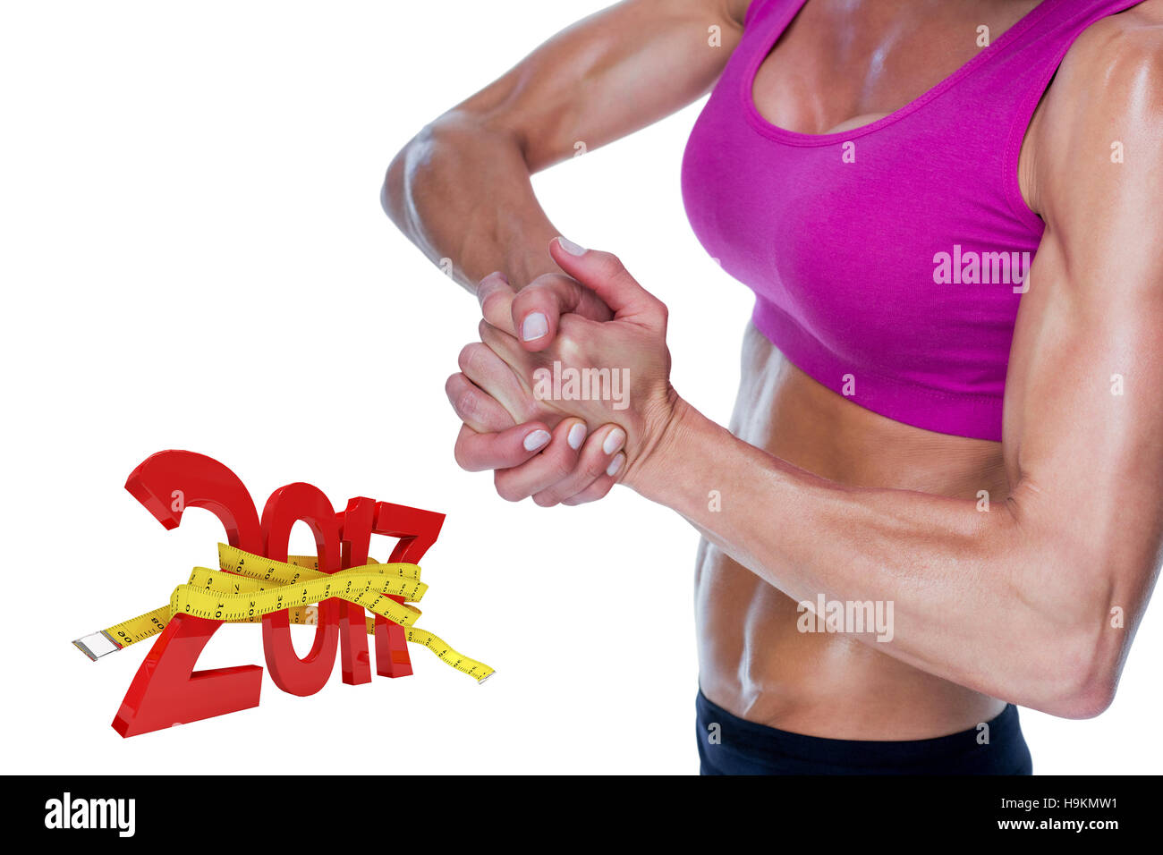 3D'immagine composita di bodybuilder femminile in posa con le mani insieme Foto Stock