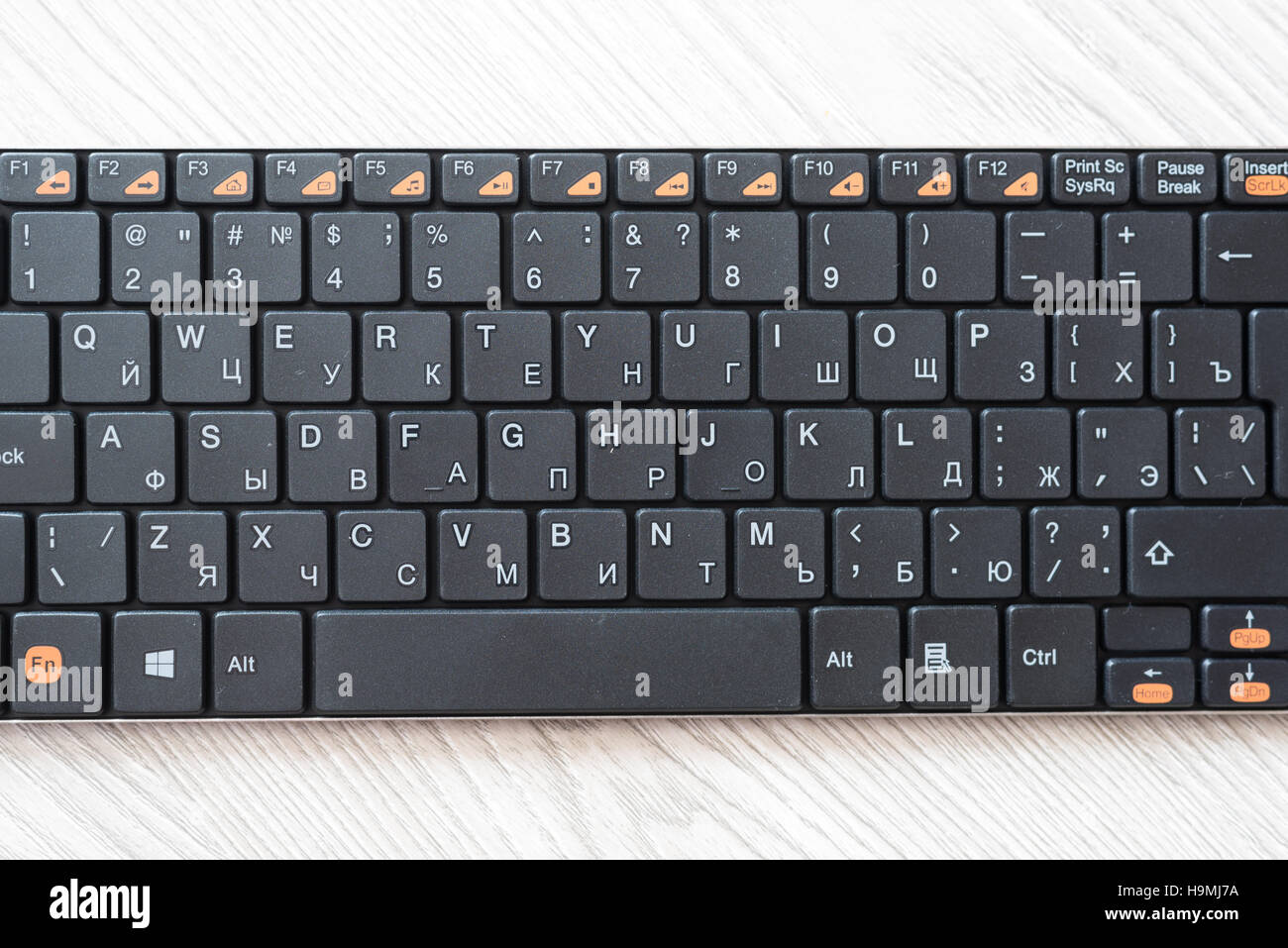 Nero con tastiera inglese e lettere in russo Foto Stock