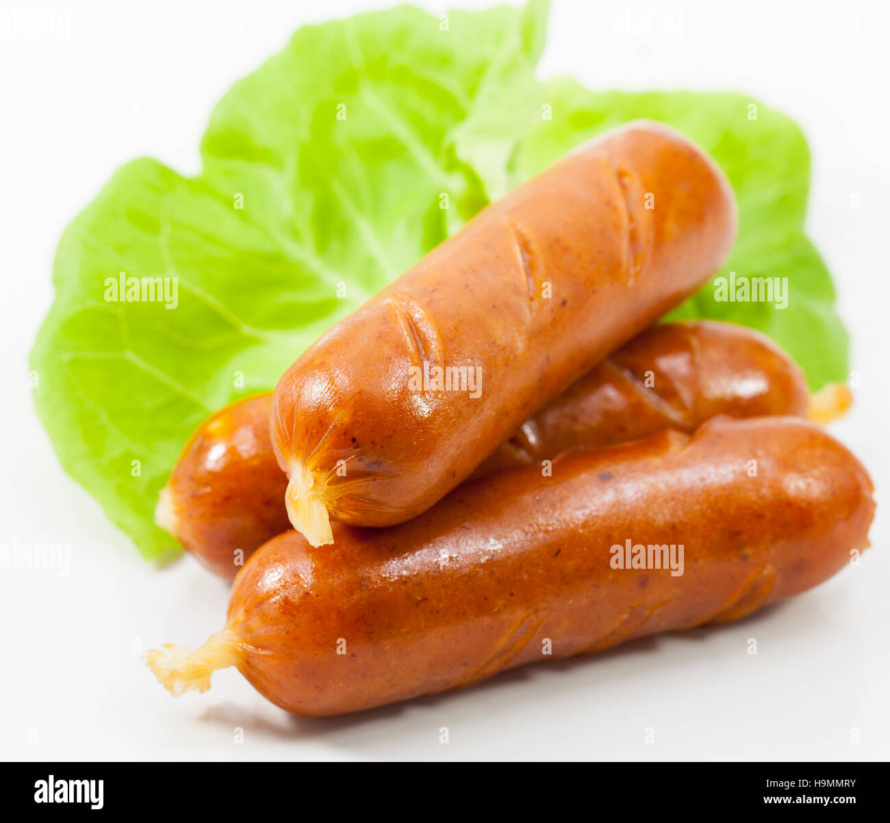 Salsicce alla griglia e verdura. Foto Stock