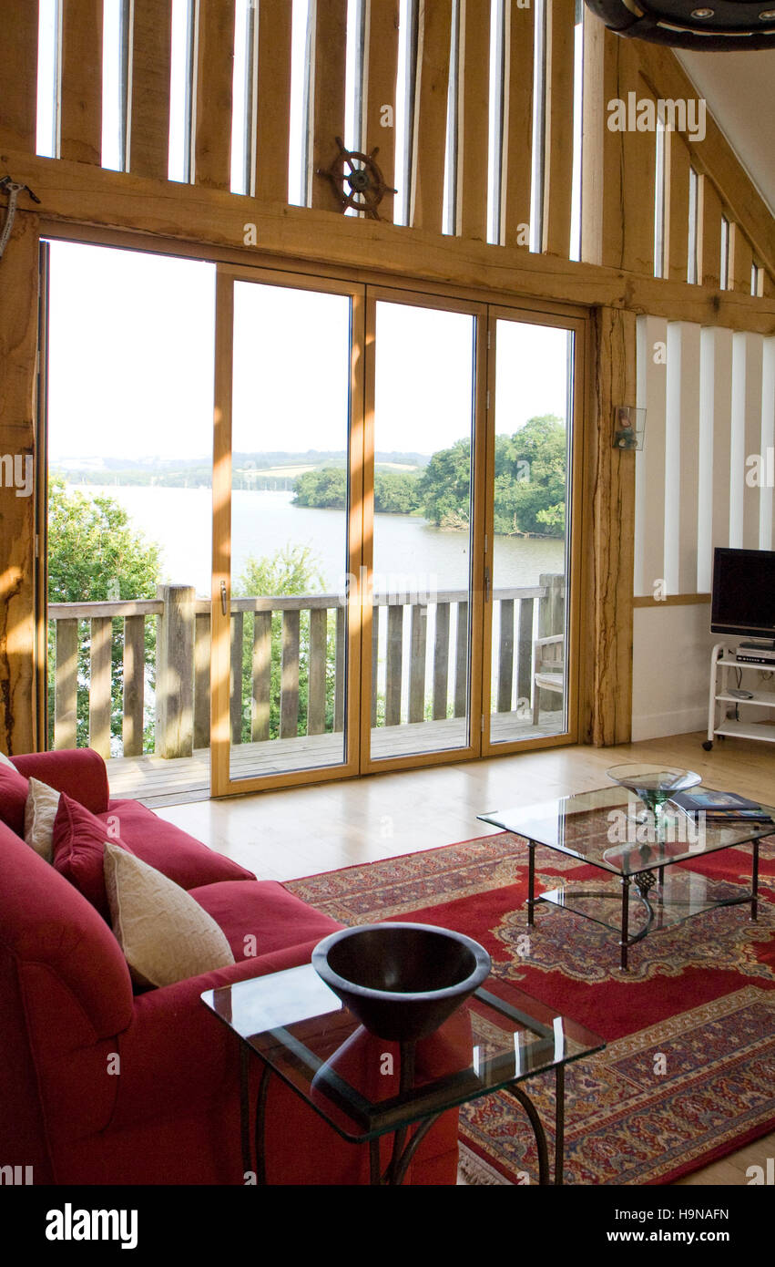 Interno di un fienile conversione area soggiorno. Foto Stock