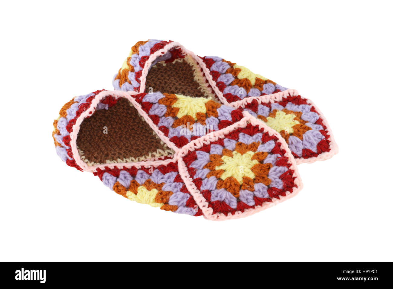 Lana fatti a mano pantofole isolati su sfondo bianco Foto Stock