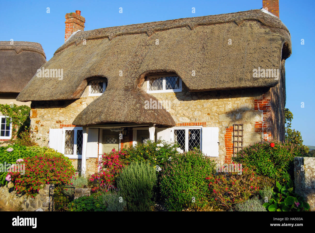 Cottage con il tetto di paglia, villaggio Godshill, Isle of Wight, England, Regno Unito Foto Stock