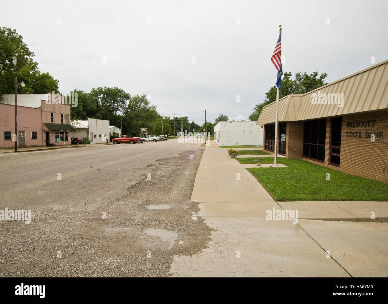 Questa immagine illustra l'impatto dell'American Recovery and Reinvestment Act (ARRA) in Kansas, evidenziando gli investimenti federali nelle comunità rurali, lo sviluppo e i miglioramenti infrastrutturali per una crescita sostenibile. Foto Stock