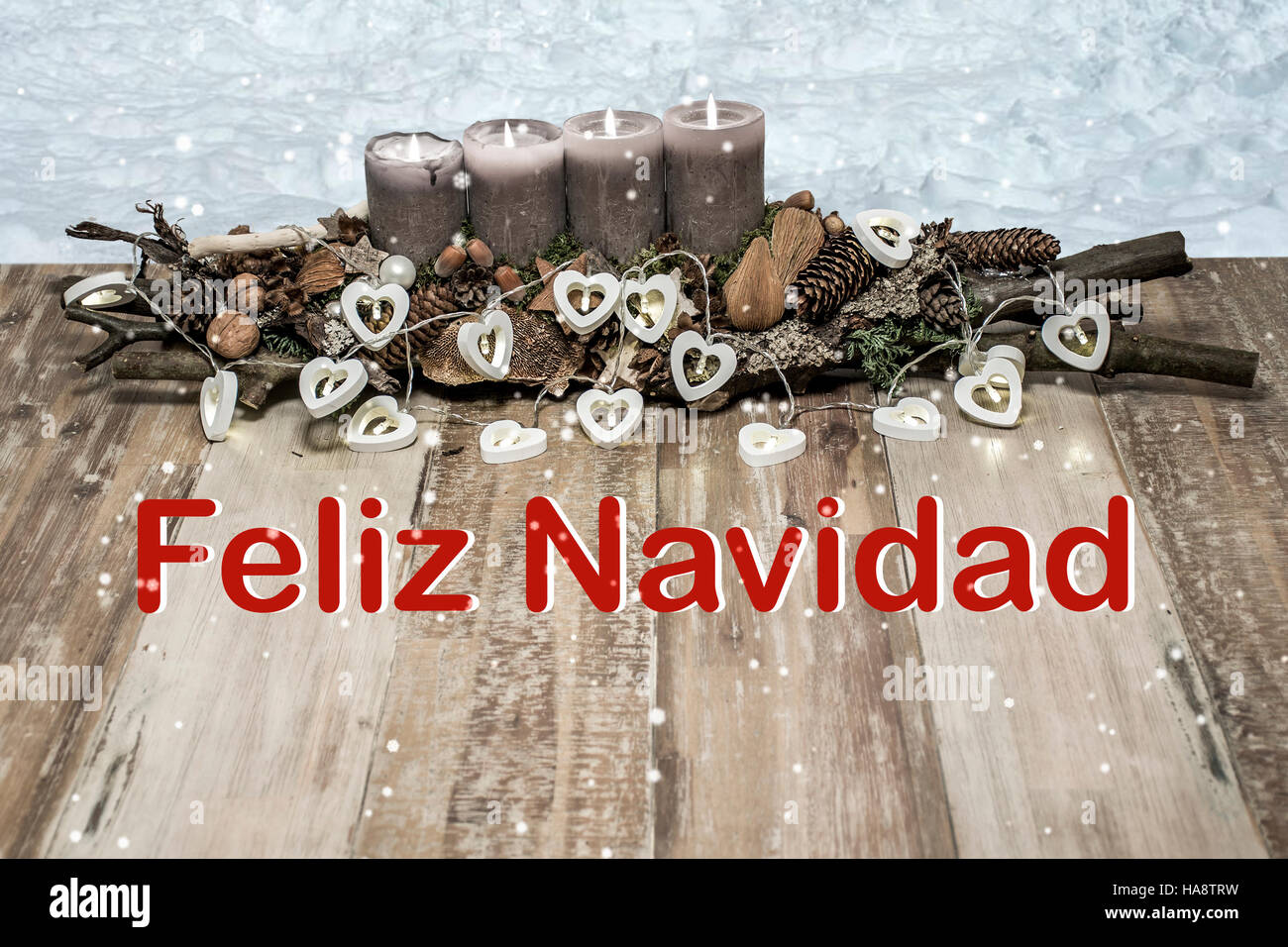 Buon Natale decorazione con la masterizzazione di candela grigio neve cuore lampada messaggio di testo di origine ispanica Foto Stock
