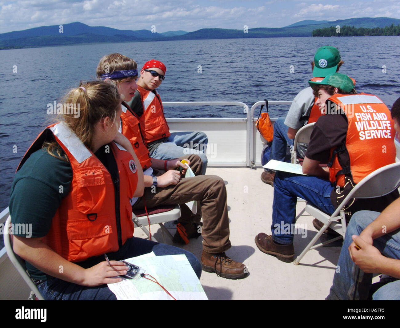 I programmi di educazione ambientale del Parco Nazionale del Lago Umbagog si concentrano sull'insegnamento ai visitatori degli ecosistemi locali, della fauna selvatica e degli sforzi per la conservazione. Tali iniziative mirano a promuovere la consapevolezza delle questioni ambientali e a promuovere azioni di conservazione. Foto Stock