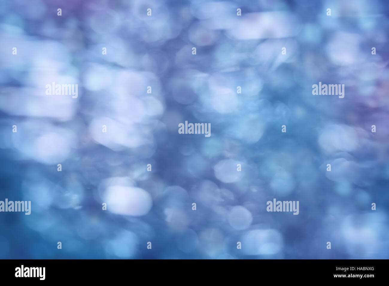 Blu sullo sfondo di Natale con un bellissimo bokeh di fondo Foto Stock