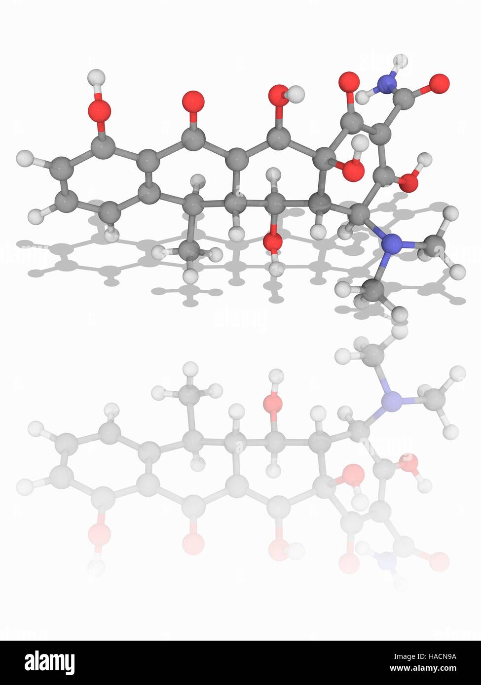 Doxiciclina. Il modello molecolare della tetraciclina farmaco antibiotico doxiciclina (C22.H24.N2.O8). Questo antibiotico ad ampio spettro è utilizzato per una varietà di condizioni, incluse le infezioni da batteri, protozoi ed elminti (vermi parassiti). Gli atomi sono rappresentati da sfere e sono codificati a colori: carbonio (grigio), Idrogeno (bianco), Azoto (blu) e ossigeno (rosso). Illustrazione. Foto Stock