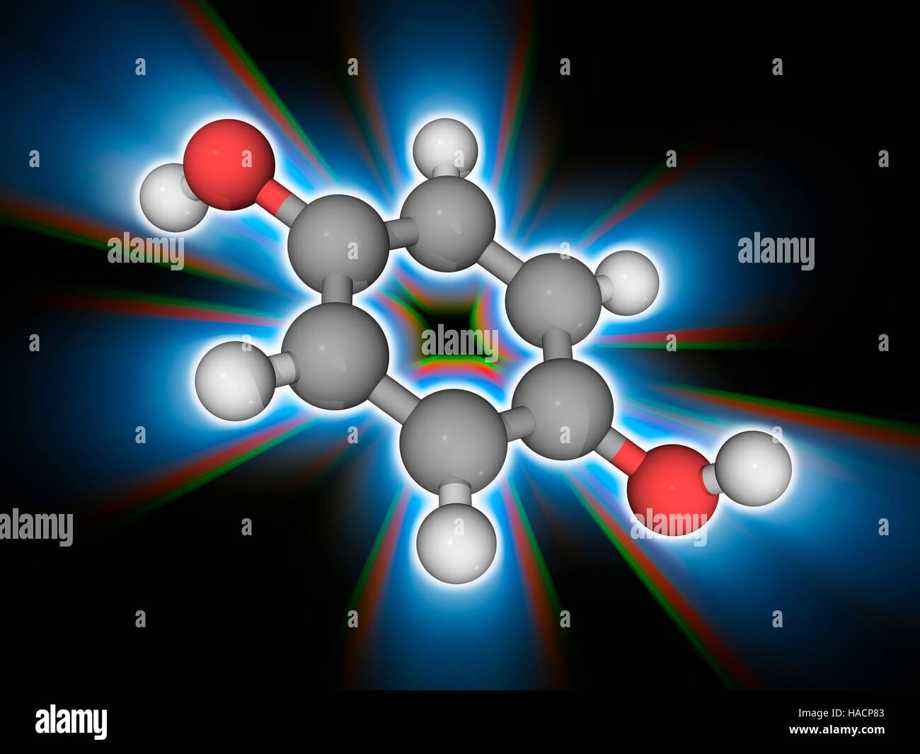 Idrochinone. Il modello molecolare dell'aromatico composto organico di idrochinone (C6.H6.O2). Questo bianco solido granulare viene utilizzato come un agente riducente ed è solubile in acqua. Gli atomi sono rappresentati da sfere e sono codificati a colori: carbonio (grigio), Idrogeno (bianco) e ossigeno (rosso). Illustrazione. Foto Stock