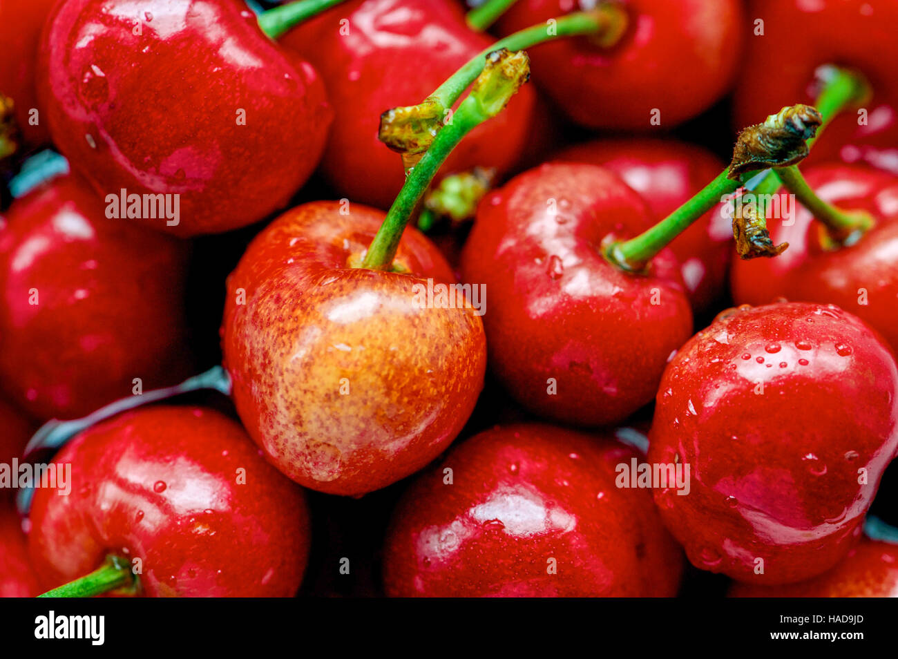 Fresche ciliege rosse texture di sfondo. La ciliegia frutta, Close up Foto Stock