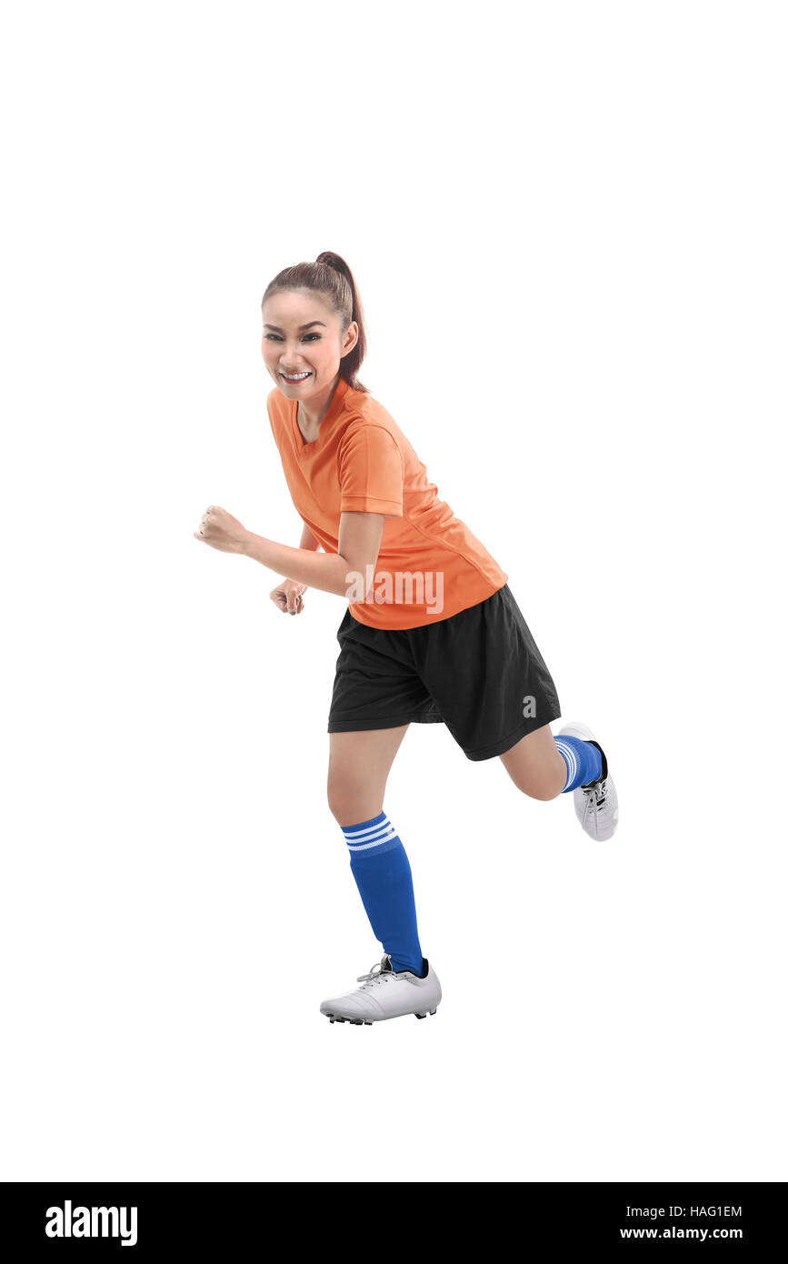 Immagine del calcio femminile player in esecuzione isolate su sfondo bianco Foto Stock