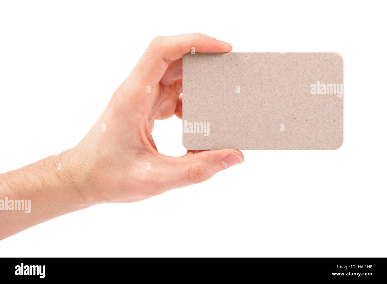 Blank business card in mano isolato su bianco Foto Stock