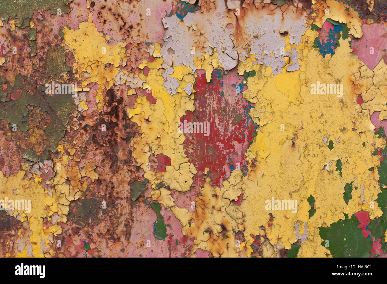 Rusty, colorata Vecchia vintage.sfondo rosso, blu, giallo, vernice verde Foto Stock