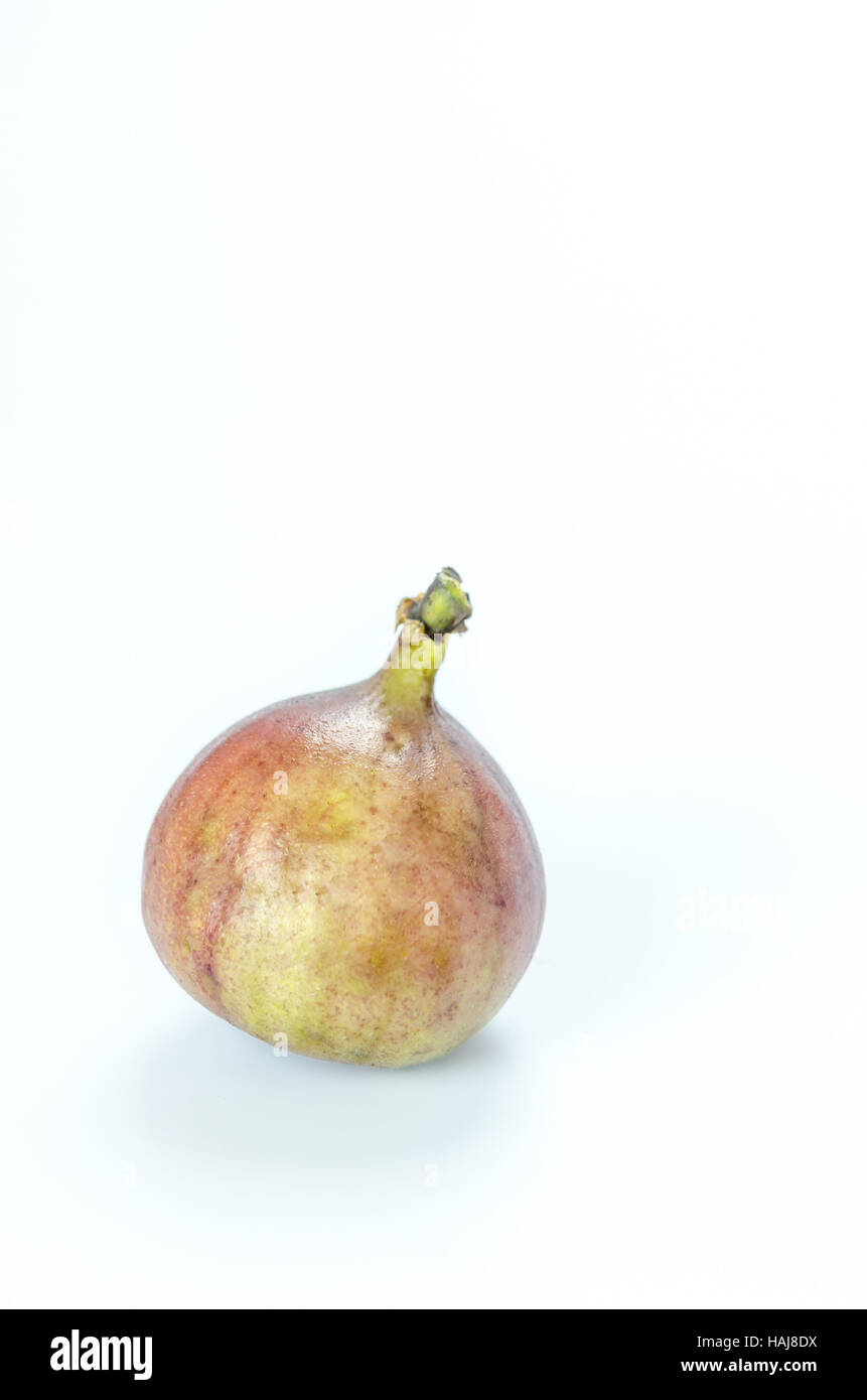 Mature dolce figura , frutta fresca su sfondo bianco Foto Stock