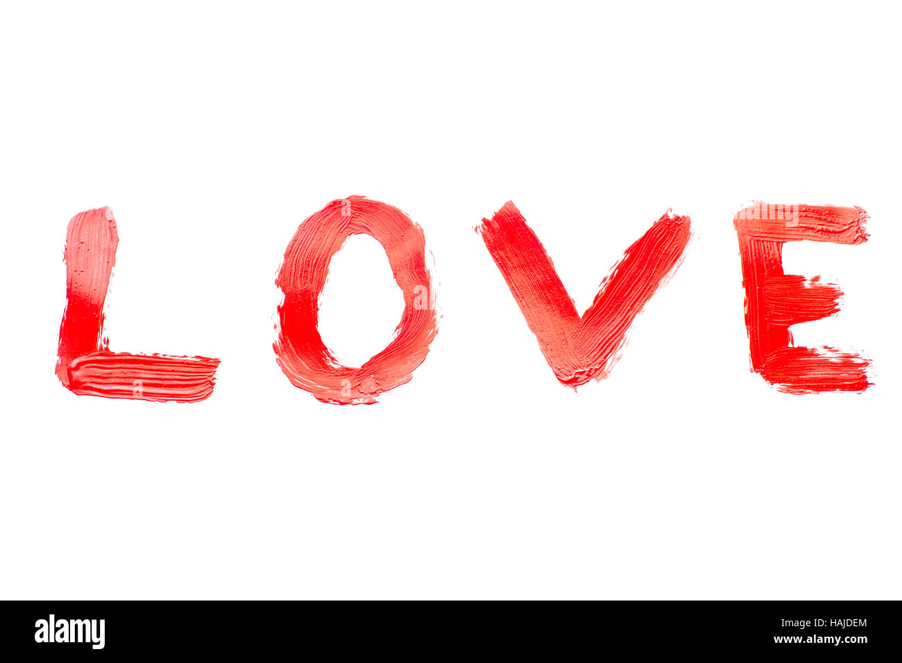 La vernice rossa è scritta la parola amore. Foto Stock