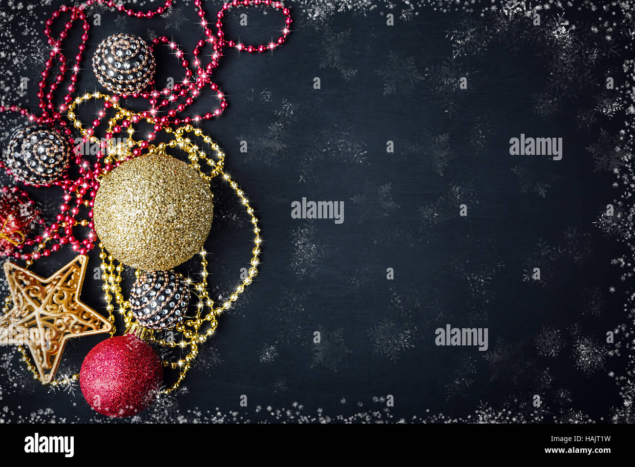 Le decorazioni di Natale su nero sfondo opaco Foto Stock