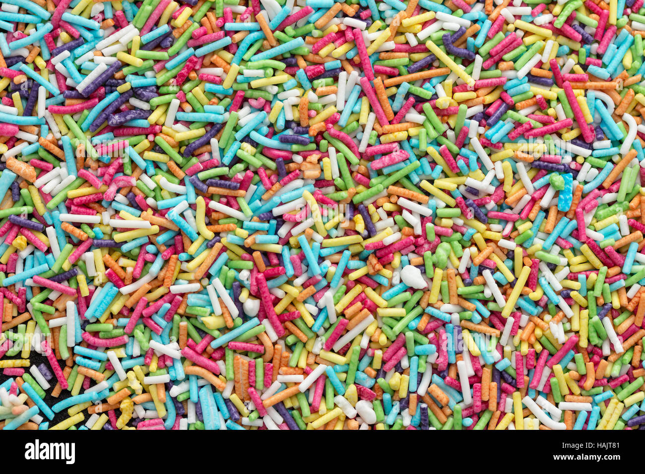 Caramelle colorate spruzza sullo sfondo Foto Stock