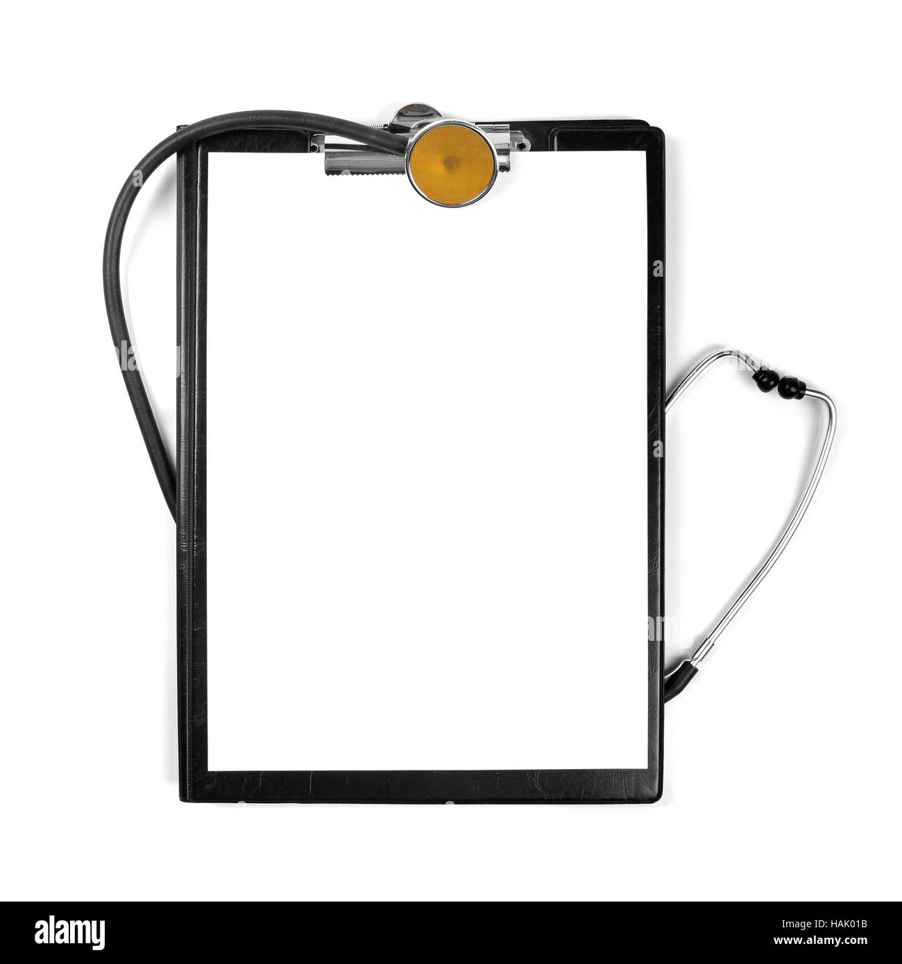 Negli appunti di vuoto con uno stetoscopio isolato su bianco Foto Stock