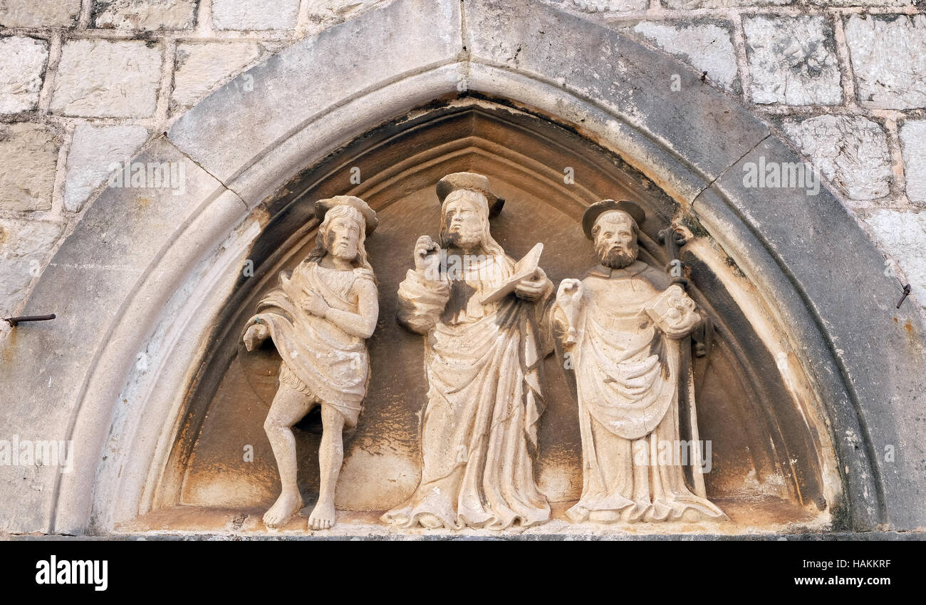 Gesù Cristo, san Giovanni Battista e San Nicola con un bastone, portale di San Luca Chiesa di Dubrovnik, Croazia Foto Stock