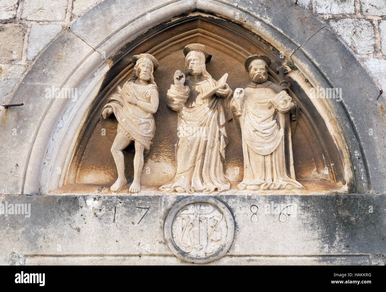 Gesù Cristo, san Giovanni Battista e San Nicola con un bastone, portale di San Luca Chiesa di Dubrovnik, Croazia Foto Stock