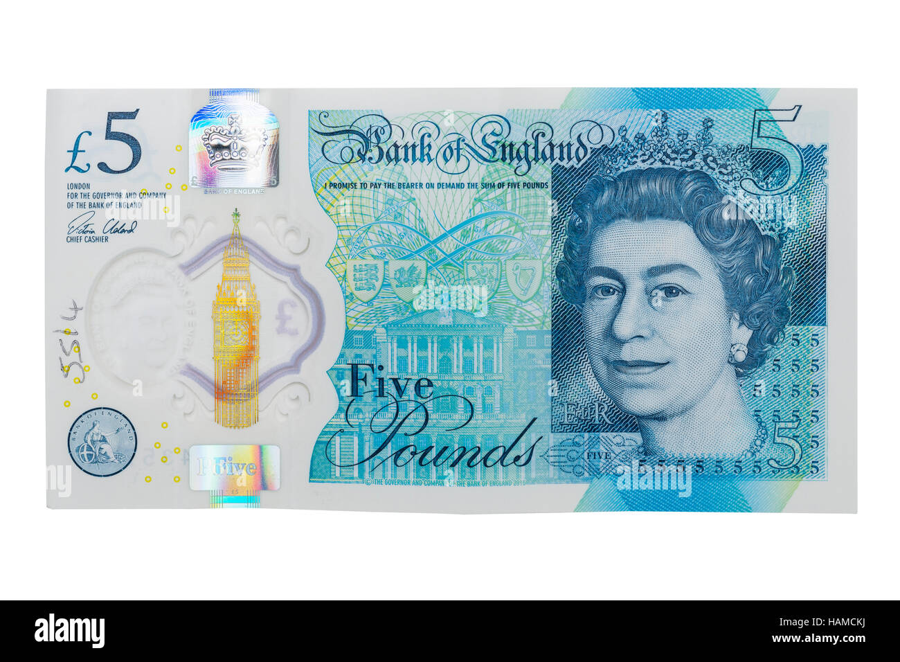 Una plastica nuovo £ 5 nota su sfondo bianco Foto Stock