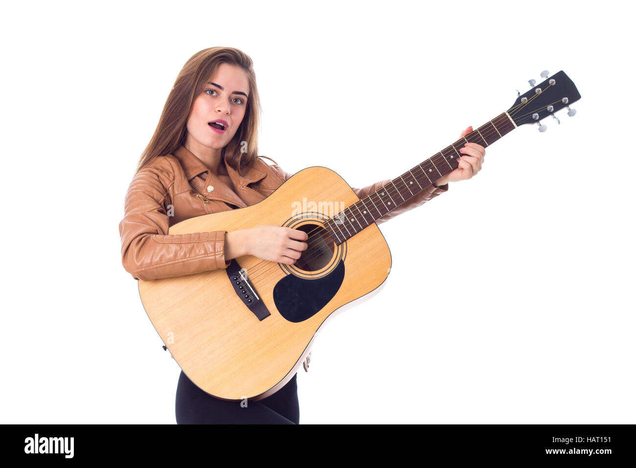 Giovane donna in possesso di una chitarra Foto Stock