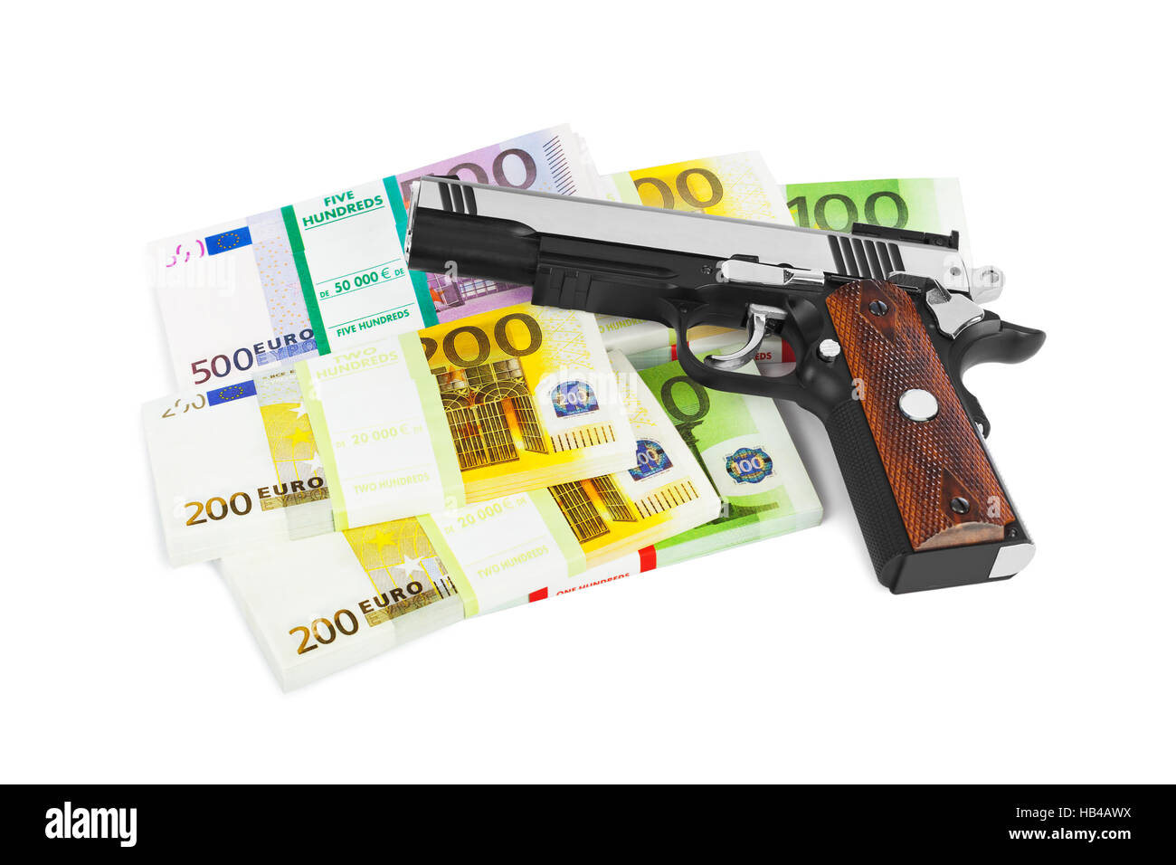 Pistola e soldi Foto Stock