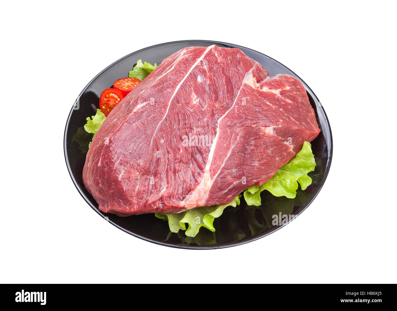 Pezzo di carne di manzo crudo isolati su sfondo bianco Foto Stock