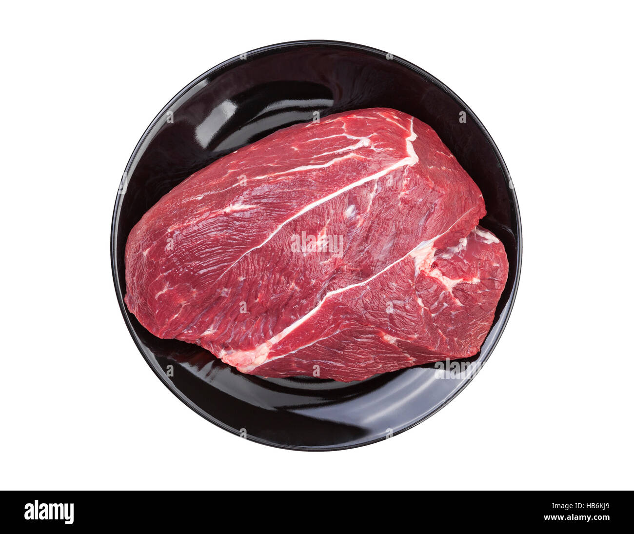 Pezzo di carne di manzo crudo isolati su sfondo bianco Foto Stock