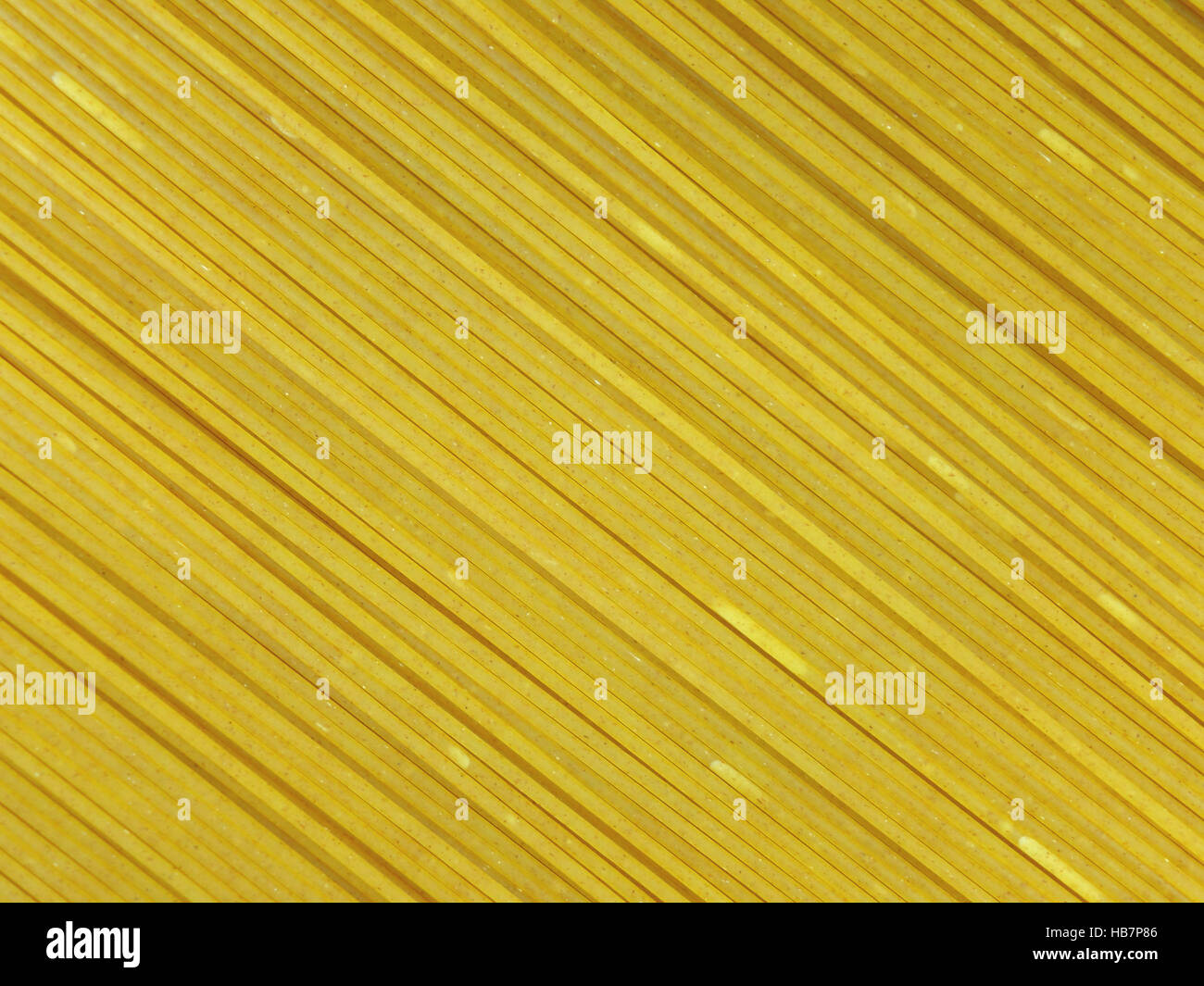 Close-up di crudo intero spaghetti di frumento, sfondo, Pattern, Tessitura Foto Stock