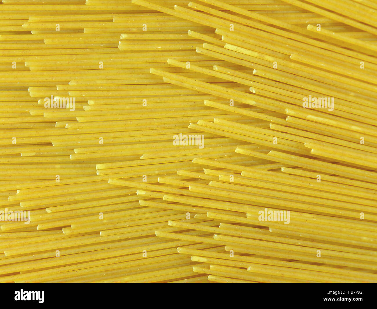 Chiuso di Crudo Intero secco spaghetti di frumento, sfondo, Pattern, Tessitura Foto Stock