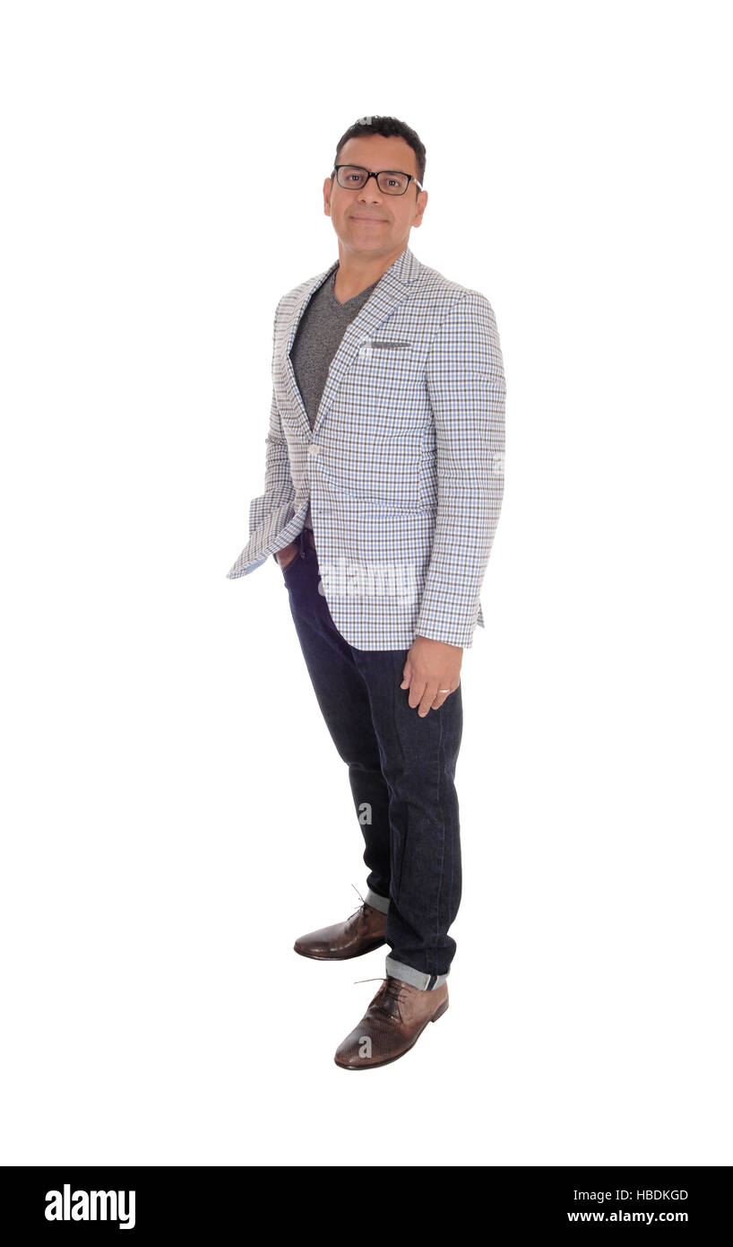 Ispanico man standing lunghezze completo. Foto Stock