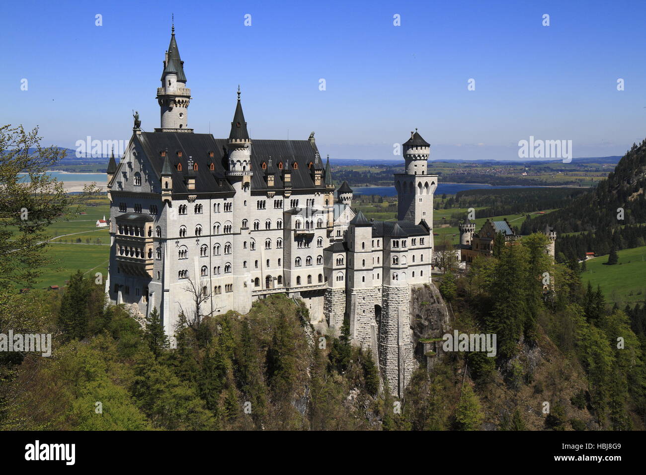 Il Castello di Neuschwanstein nelle Alpi Bavaresi Foto Stock