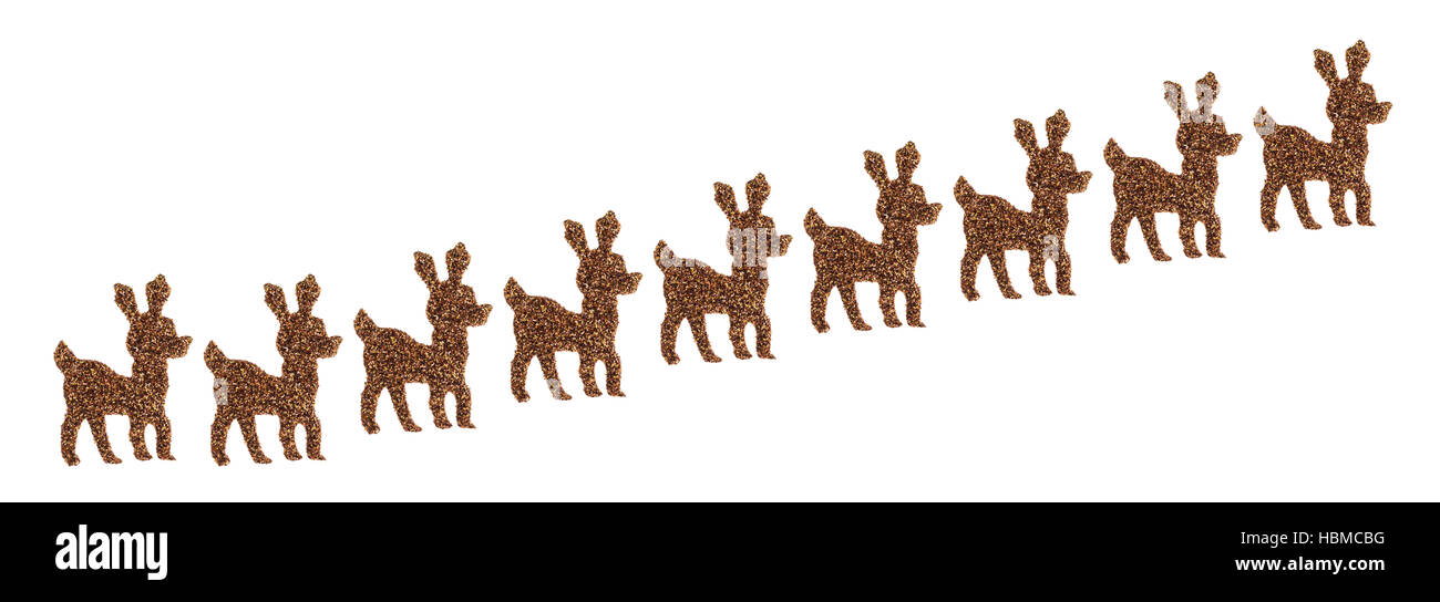 Un gruppo di marrone glitter adesivi di renne salendo verso l'alto isolato su uno sfondo bianco. Foto Stock