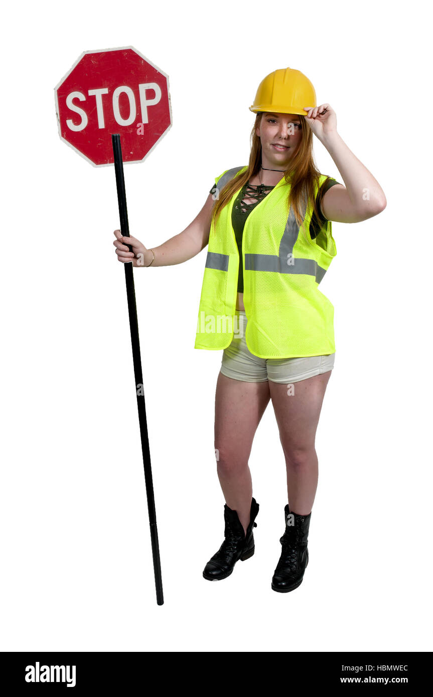 Workman con il segnale di arresto Foto Stock