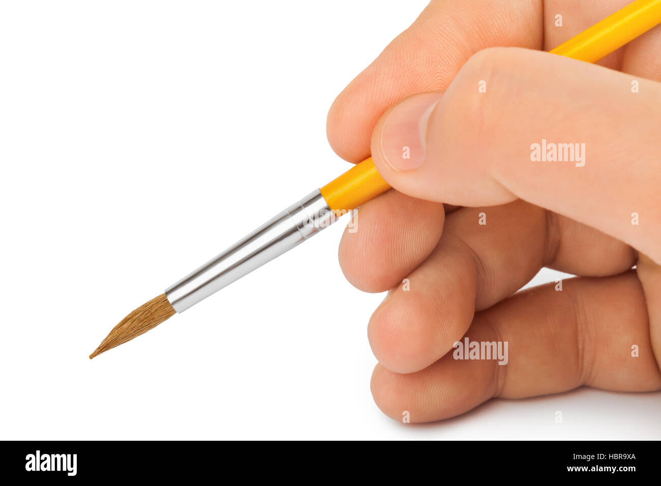 Mano con pennello Foto Stock