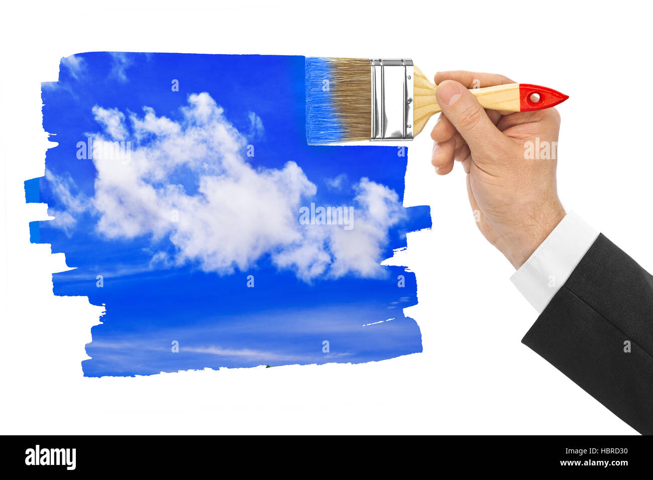 Mano con pennello disegno sky Foto Stock