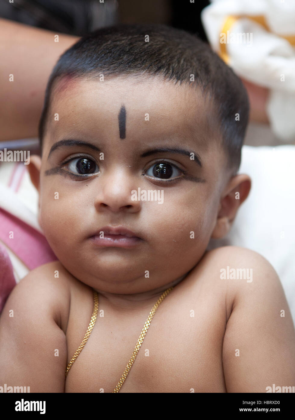 Ritratto di un paffuto bambina in Kerala, India Foto Stock