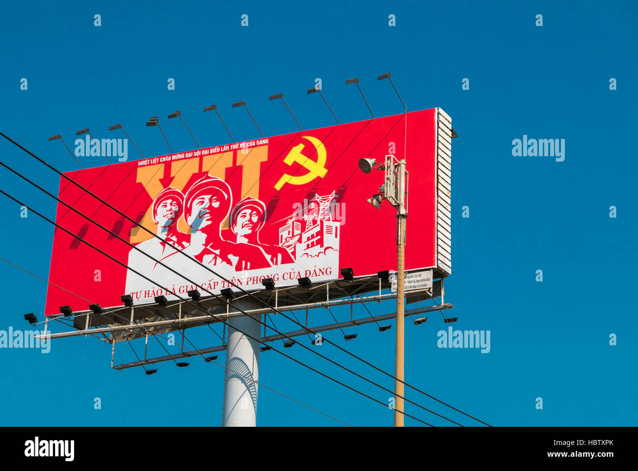 Outdoor Billboard con politiche di propaganda comunista, Ho Chi Minh. Foto Stock